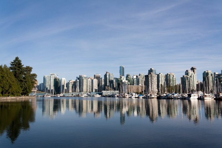 sco vancouver skyline reflected in coal harbour british columbi
